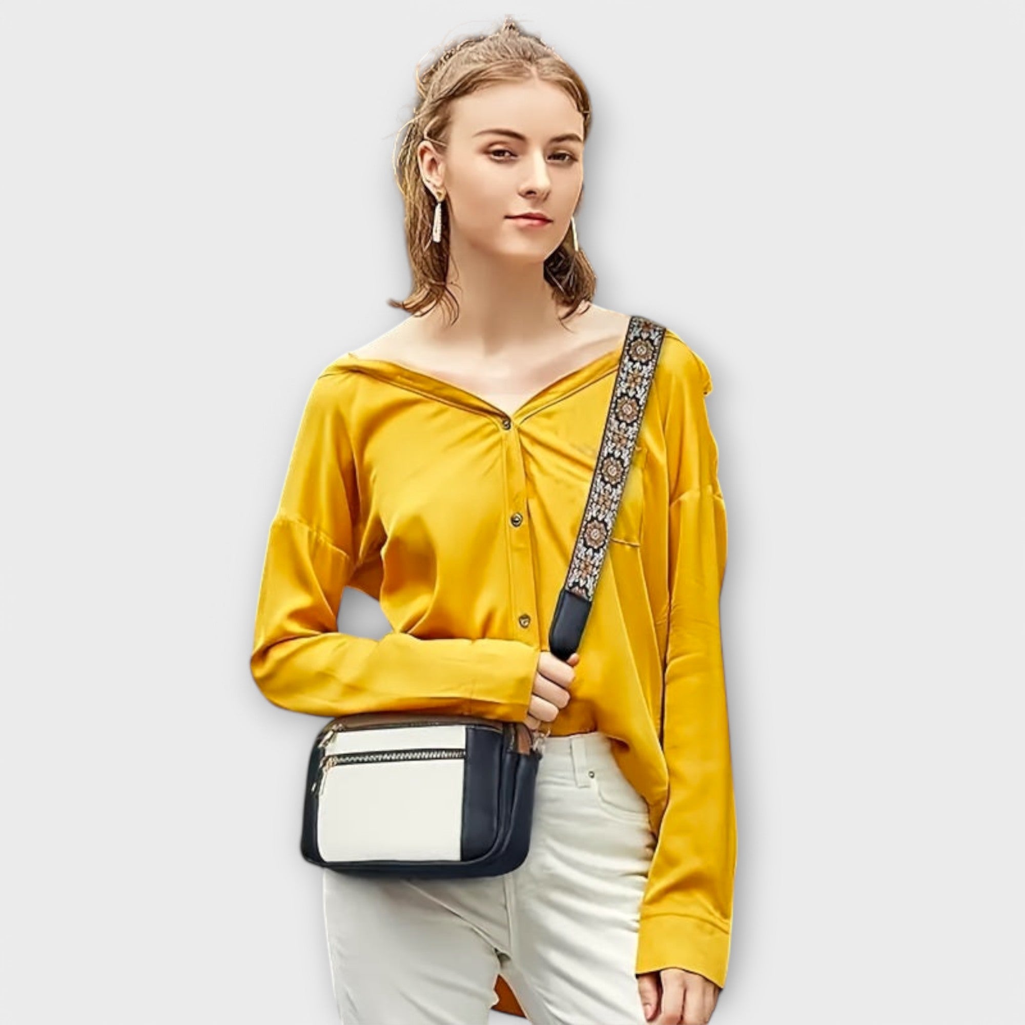Aurellia. - Crossbody-veske laget av vegansk lær