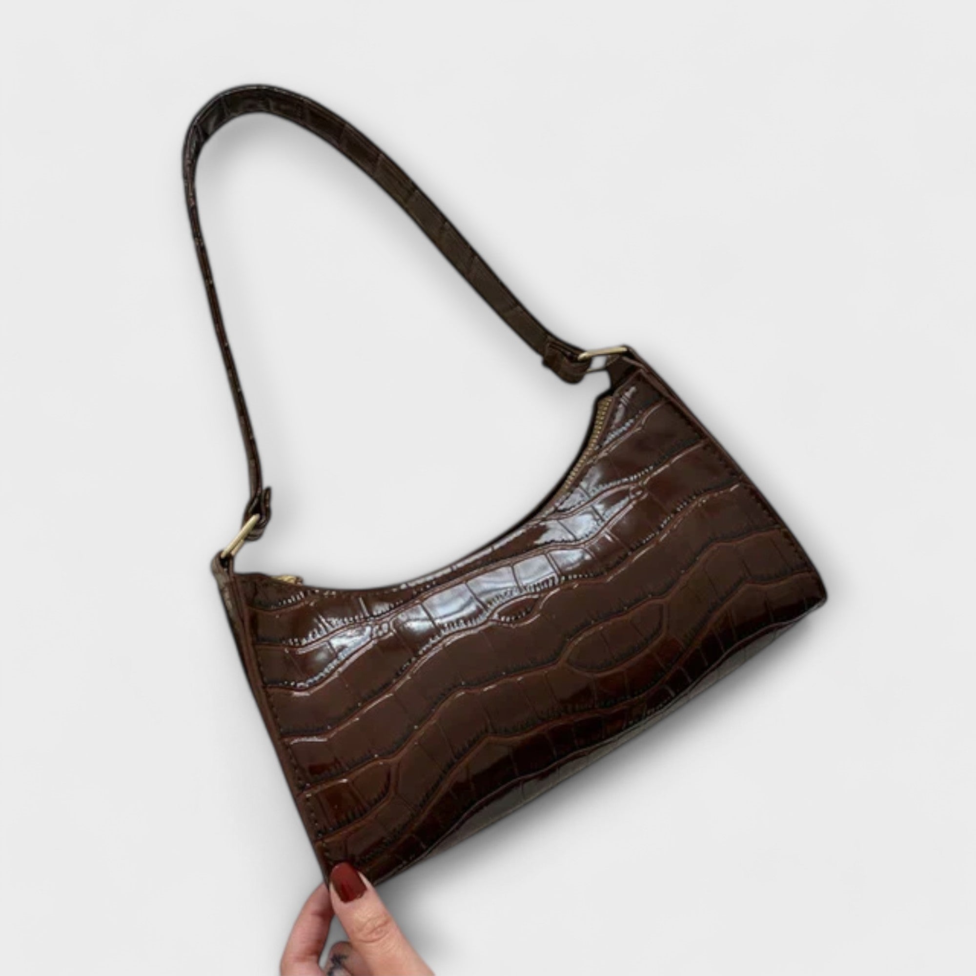 Aurellia. - Skinnveske med Glans