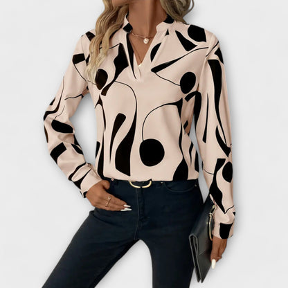 Elegant bluse med lange ermer og spiss hals