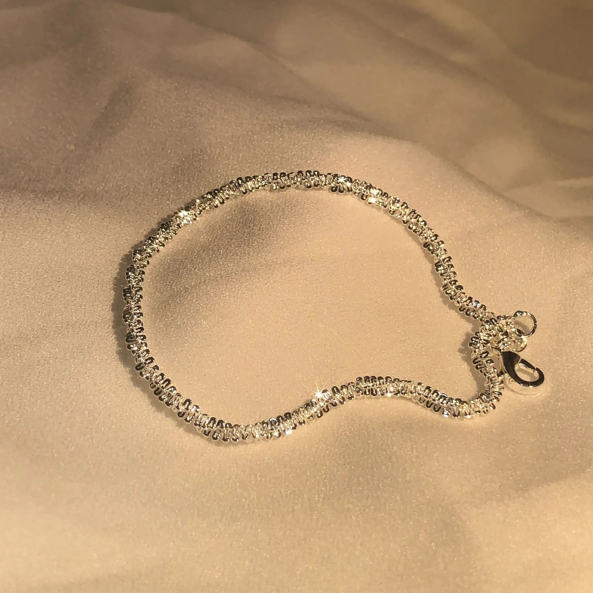 Skinnende Armbånd