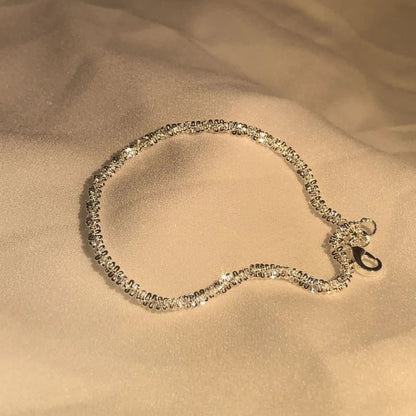 Skinnende Armbånd
